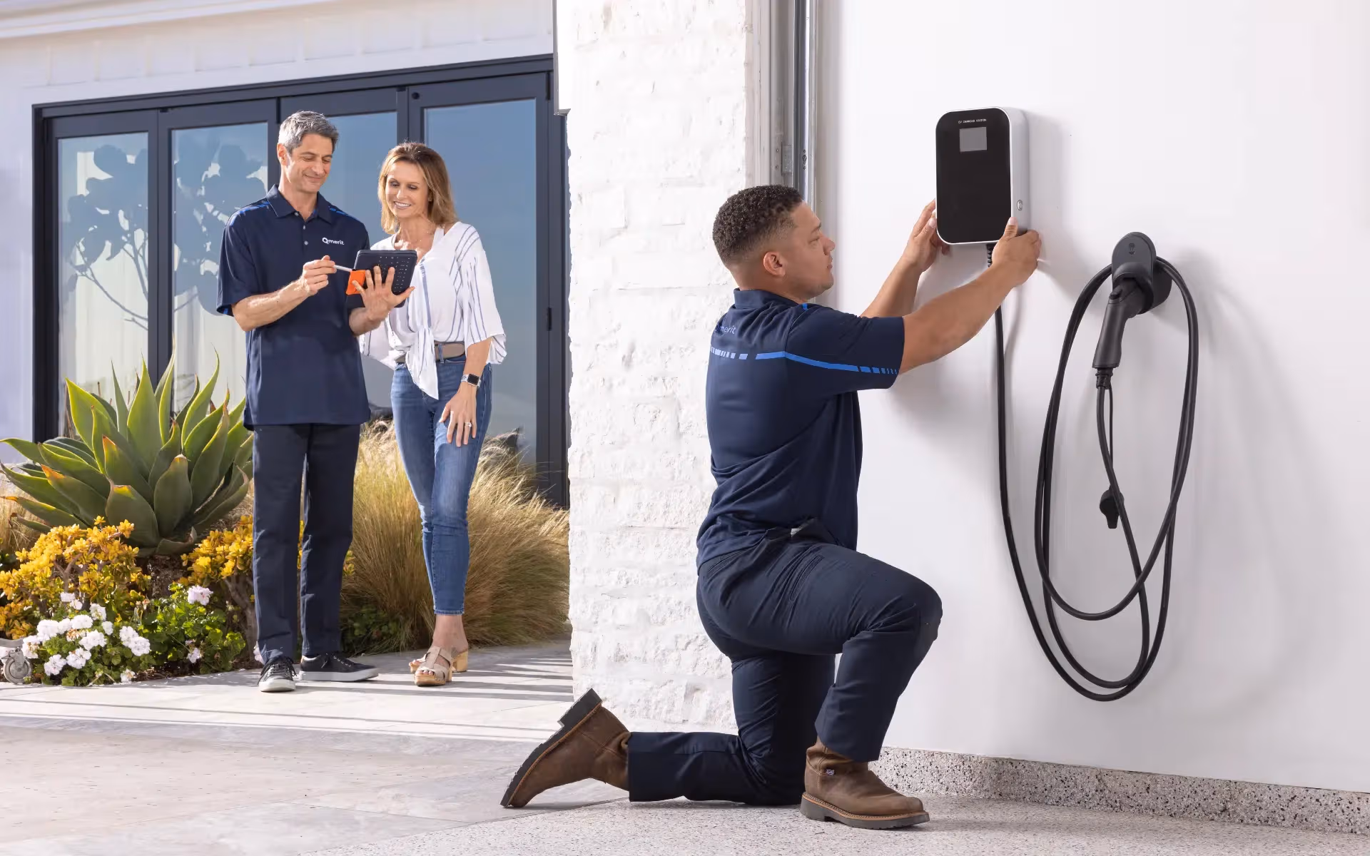 Elite Electrical engineer installing a home EV charging point
